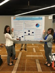 Carolyn and Lenna presenting a poster at the 2016 APS conference.